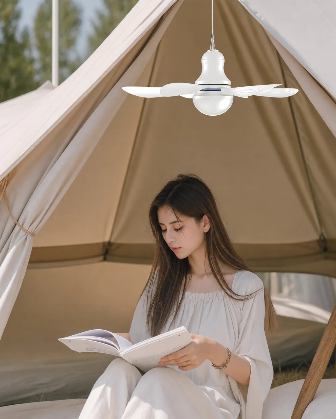 USB camping fan light hanging inside a neutral outdoor tent